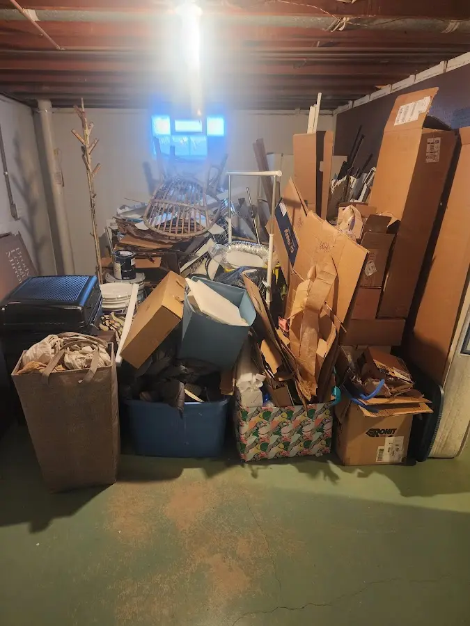 Roll-off dumpster container at job site for 4 Yard Dumpster Rental in Highgate